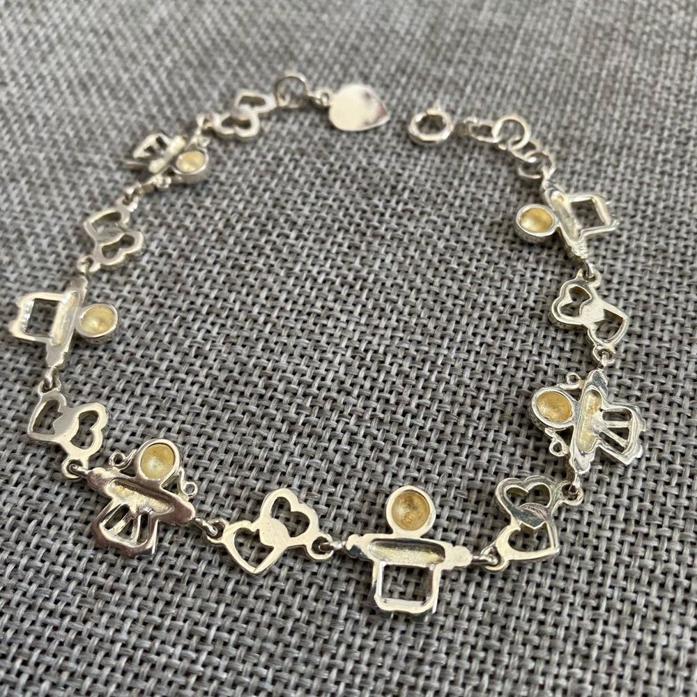 Boy and girl themed silver bracelet